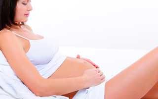У беременной девушки болит спина